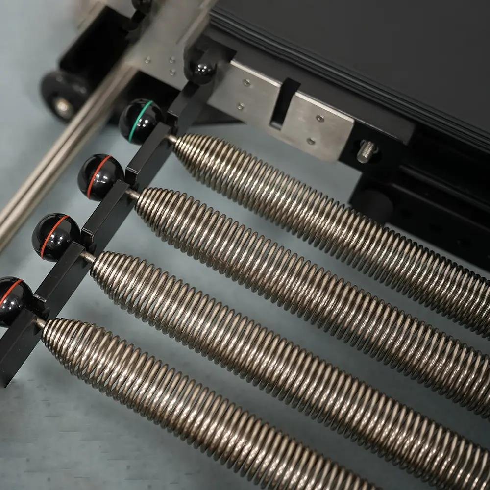 About Us Close-up of a Pilates equipment spring