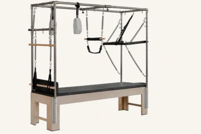 Vimora maple wood Cadillac Pilates reformer with integrated legs, for professional studio use