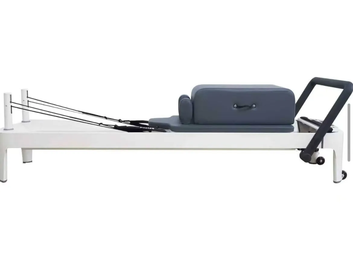 vimora reformer aluminum 1st gen full track white 06.webp Vimora aluminum-frame white full track Pilates reformer, for professional studio use