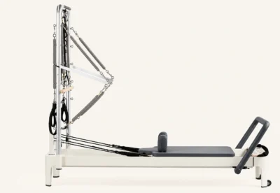 Vimora aluminum-frame fixed track Pilates reformer with half tower, for professional studio use