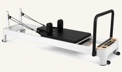 Vimora aluminum-frame white fixed track Pilates reformer, for professional studio use