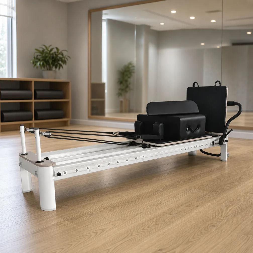 vimora reformer aluminum 4th gen full track white 03.webp Vimora aluminum-frame white full track Pilates reformer, for professional studio use