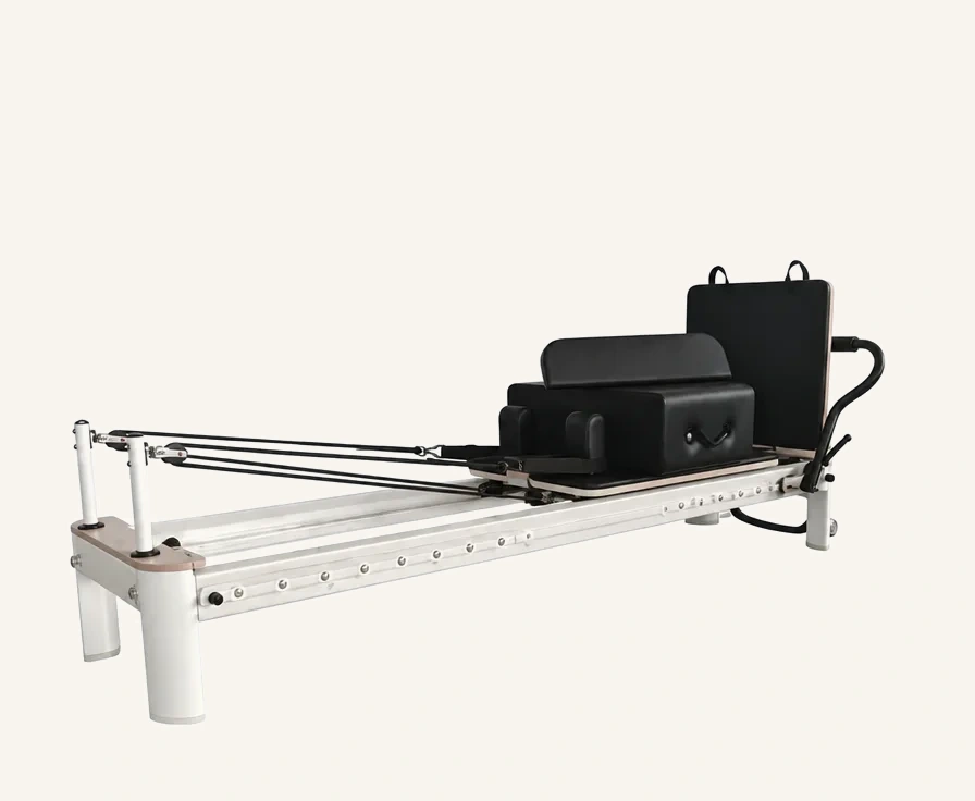 vimora reformer aluminum 4th gen full track white.webp Vimora aluminum-frame white full track Pilates reformer, for professional studio use
