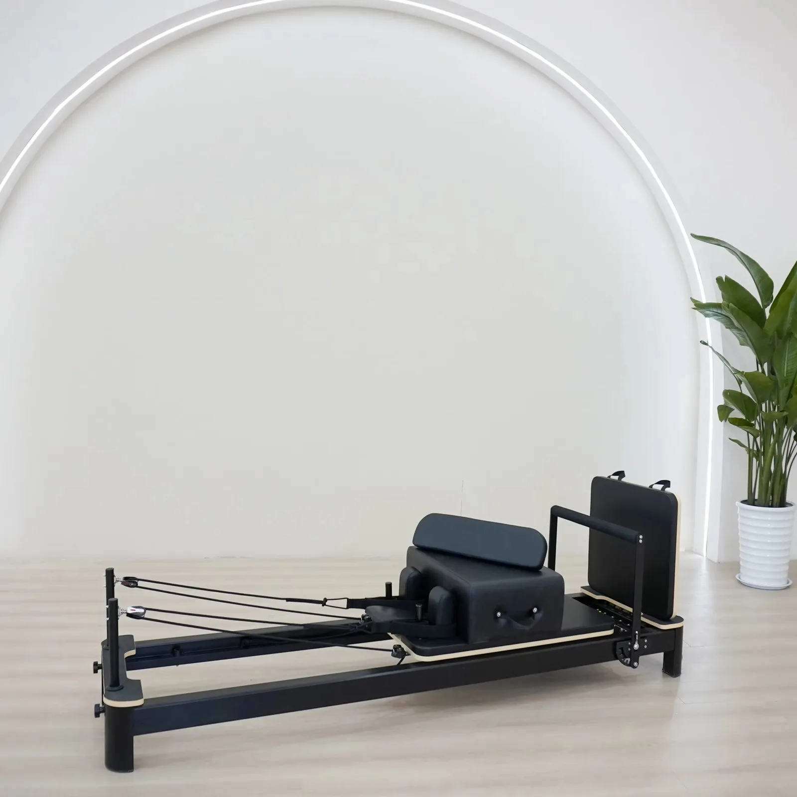 vimora reformer aluminum 4th gen white 11.webp Vimora aluminum-frame white Pilates reformer, for professional studio use