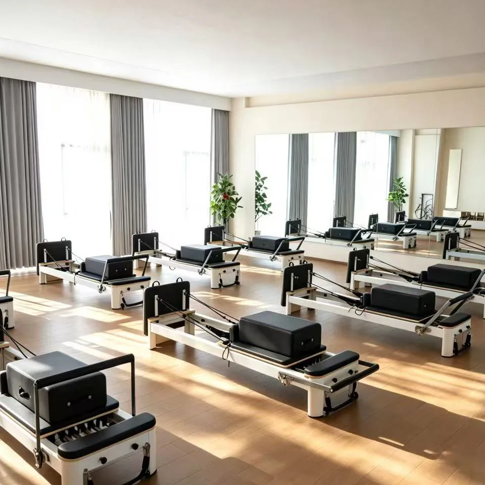 vimora reformer aluminum 4th gen white 17.webp Vimora aluminum-frame white Pilates reformer, for professional studio use