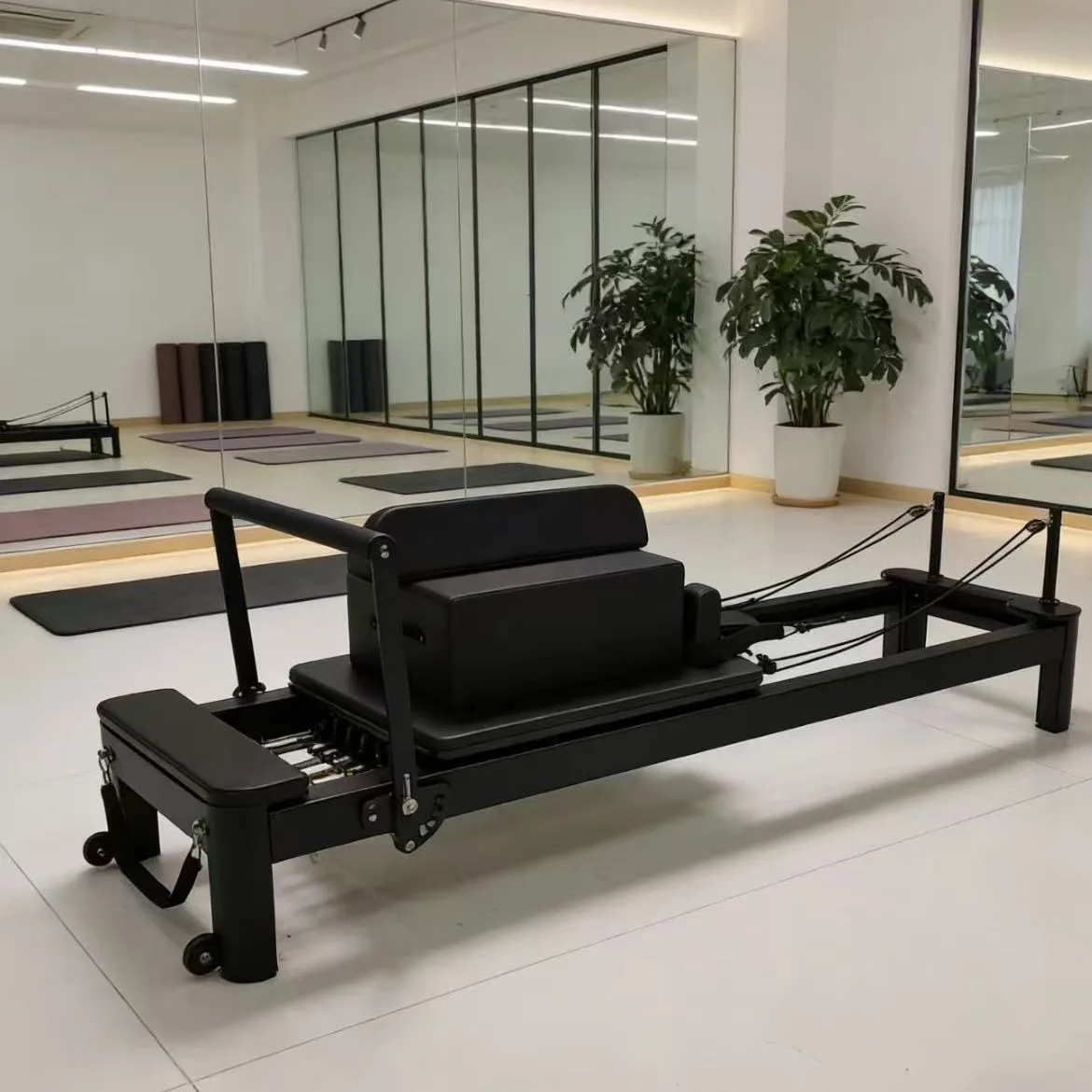 vimora reformer aluminum 4th gen white 29.webp Vimora aluminum-frame white Pilates reformer, for professional studio use