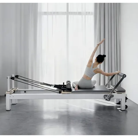 vimora reformer aluminum 4th gen white 31.webp Vimora aluminum-frame white Pilates reformer, for professional studio use