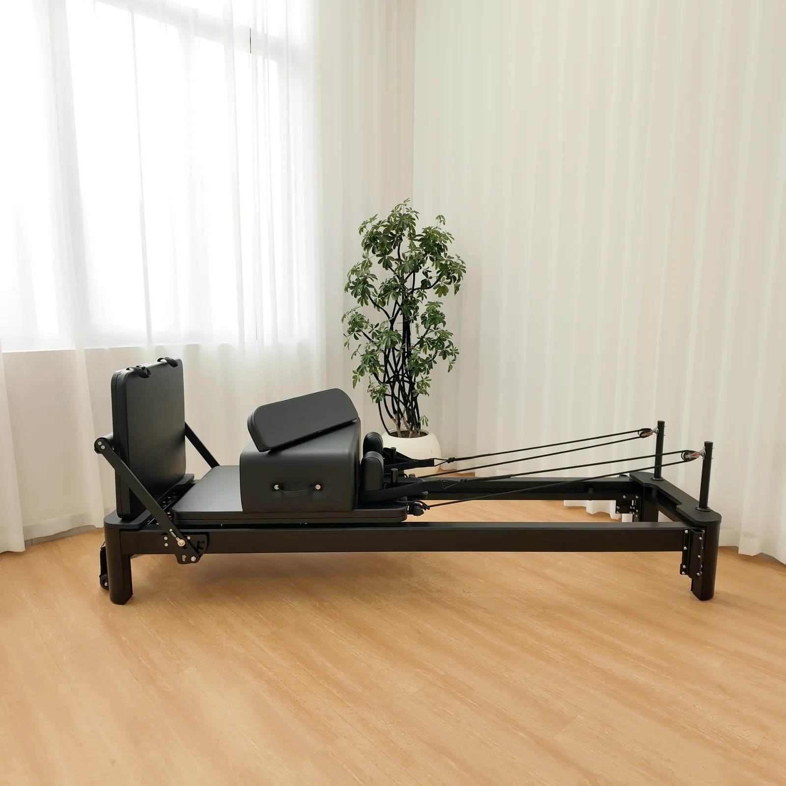 vimora reformer aluminum 4th gen white 36.webp Vimora aluminum-frame white Pilates reformer, for professional studio use