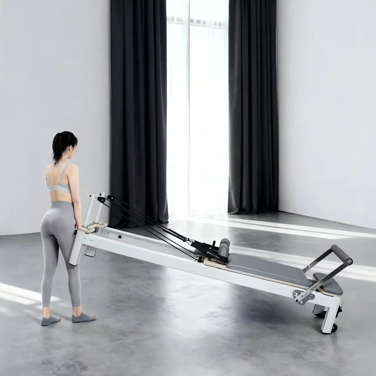 vimora reformer aluminum 4th gen white 41.webp Vimora aluminum-frame white Pilates reformer, for professional studio use