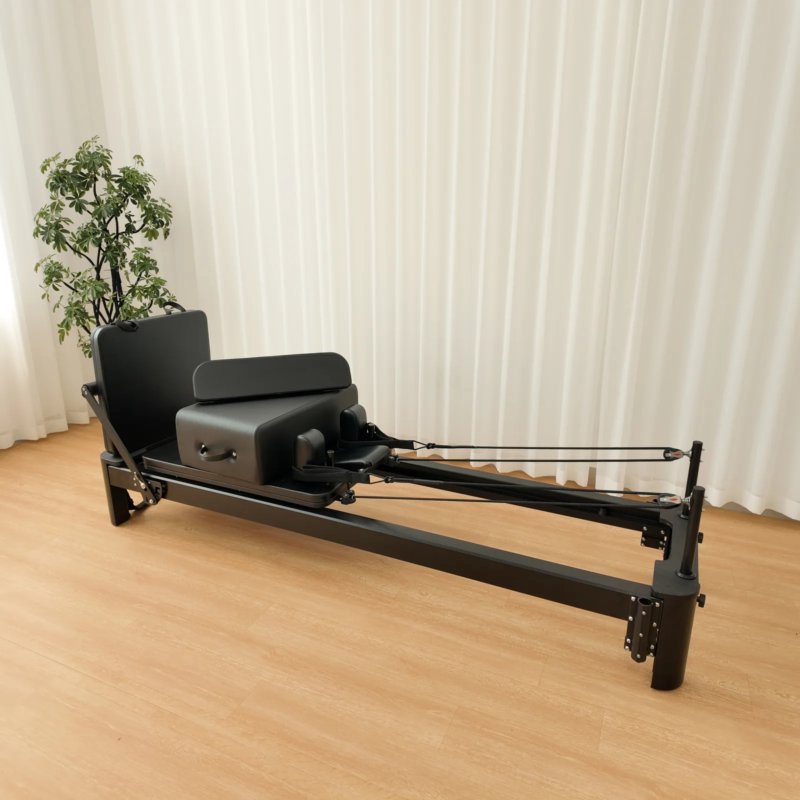 vimora reformer aluminum 4th gen white 42.webp Vimora aluminum-frame white Pilates reformer, for professional studio use