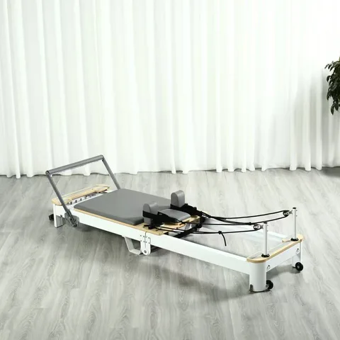 vimora reformer aluminum folding white 07.webp Vimora aluminum-frame white folding Pilates reformer, for professional studio use