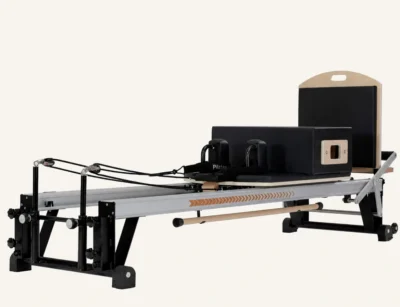 Vimora aluminum-frame Merrithew-style Pilates reformer, for professional studio use