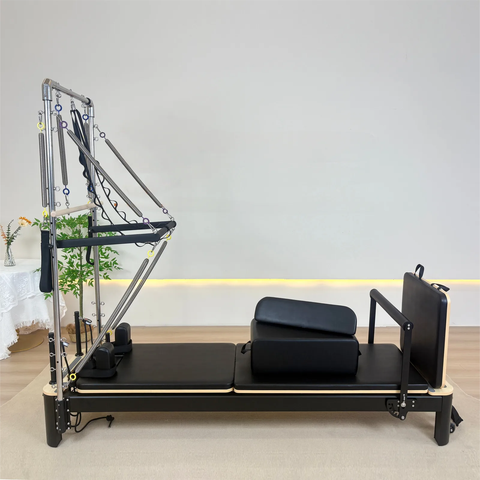 vimora reformer aluminum white half tower 06.webp Vimora aluminum-frame white Pilates reformer with half tower, for professional studio use