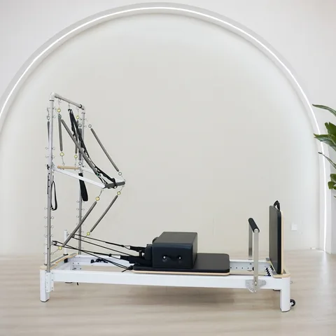 vimora reformer aluminum white half tower 12.webp Vimora aluminum-frame white Pilates reformer with half tower, for professional studio use