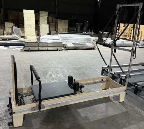 vimora reformer maple basi style full track half tower 03.webp Vimora maple wood BASI-style full track Pilates reformer with half tower, for professional studio use