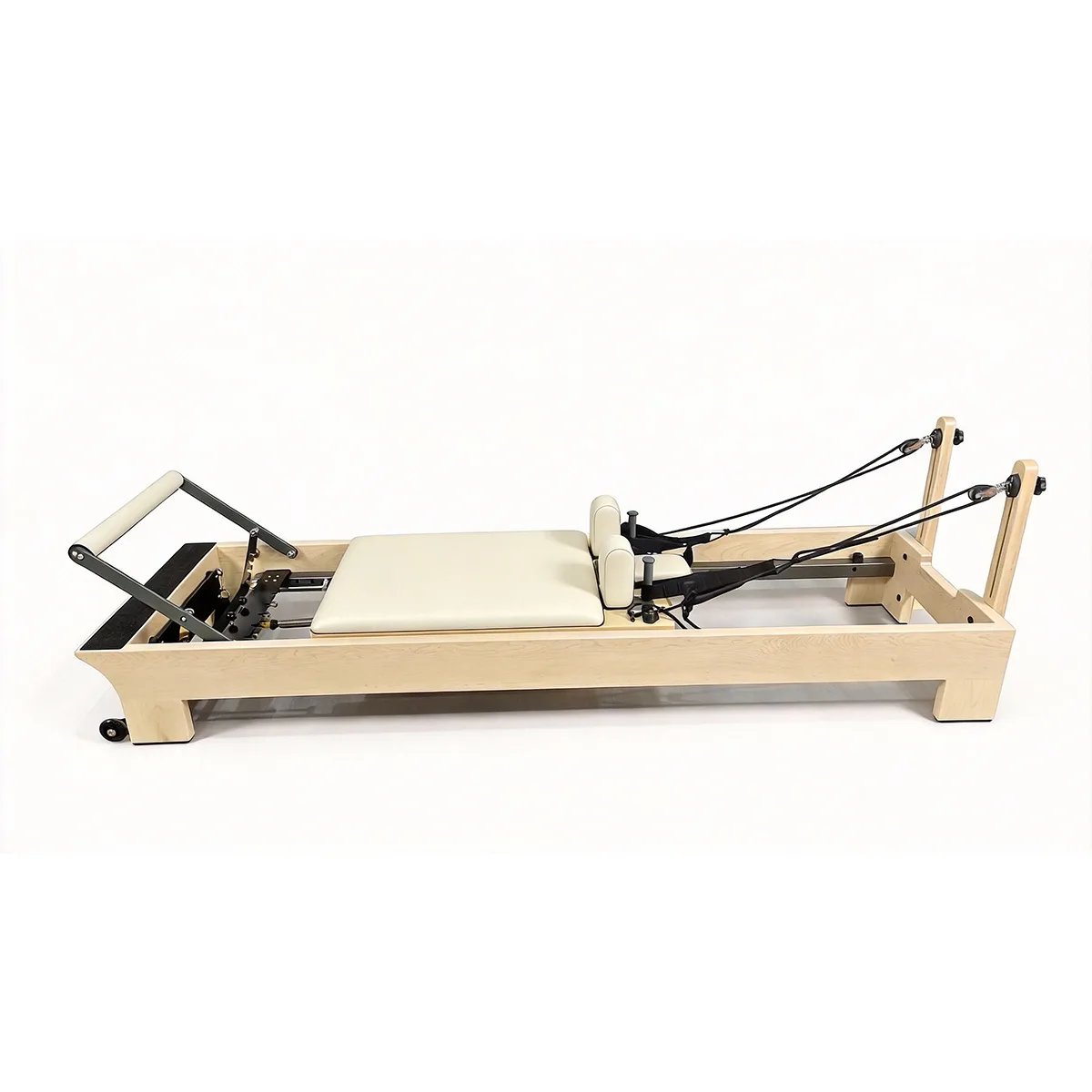 vimora reformer maple built in footbar 06.webp Vimora maple wood Pilates reformer with built-in footbar, for professional studio use