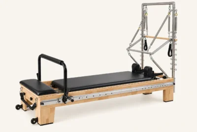Vimora oak wood full track Pilates reformer with half tower, for professional studio use