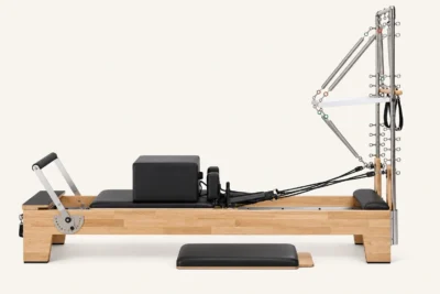 Vimora oak wood Pilates reformer with half tower, for professional studio use